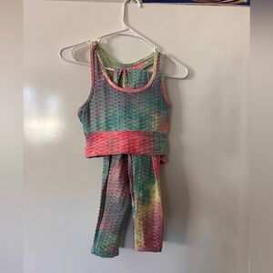 Pink and green tie dye sports bra and leggings set.